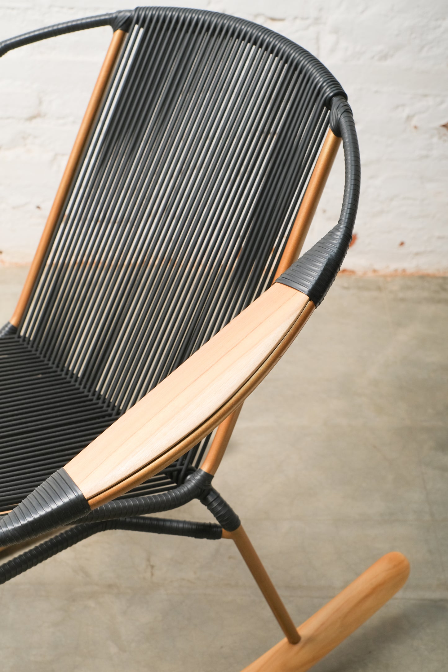 Solido Black Rocking Chair with Copper Frame – Modern Indoor & Outdoor Teak Rocker